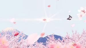 桃花盛開蝴蝶漫遊的美麗PPT背景圖片